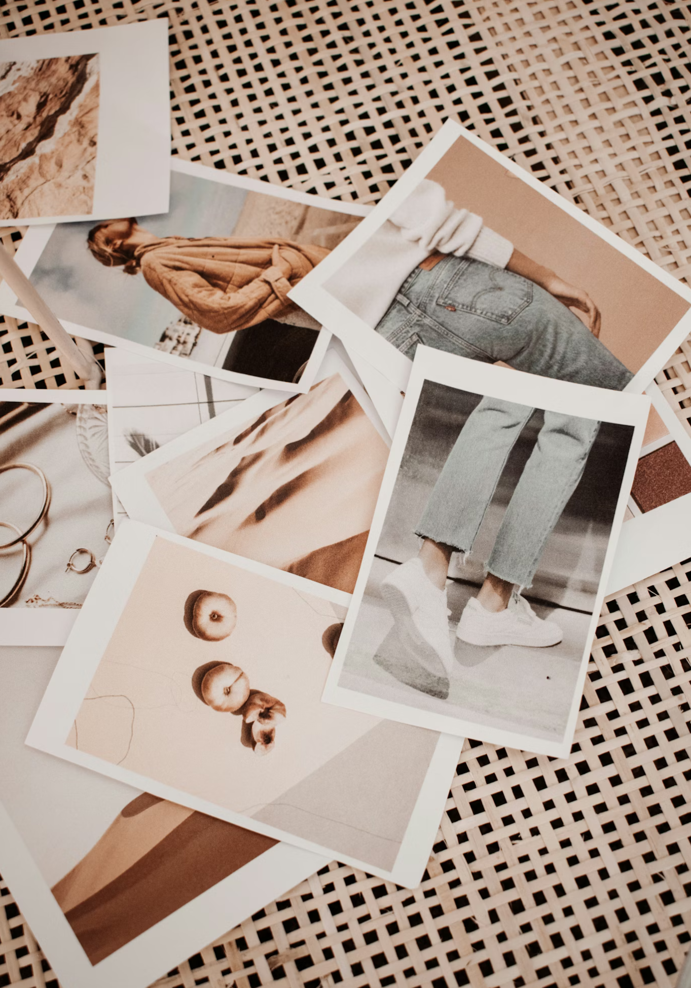 Pile of printed photos on a table